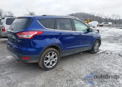 2014 Ford Escape Titanium z USA, uszkodzony, nr VIN 1FMCU9J97EUB26774